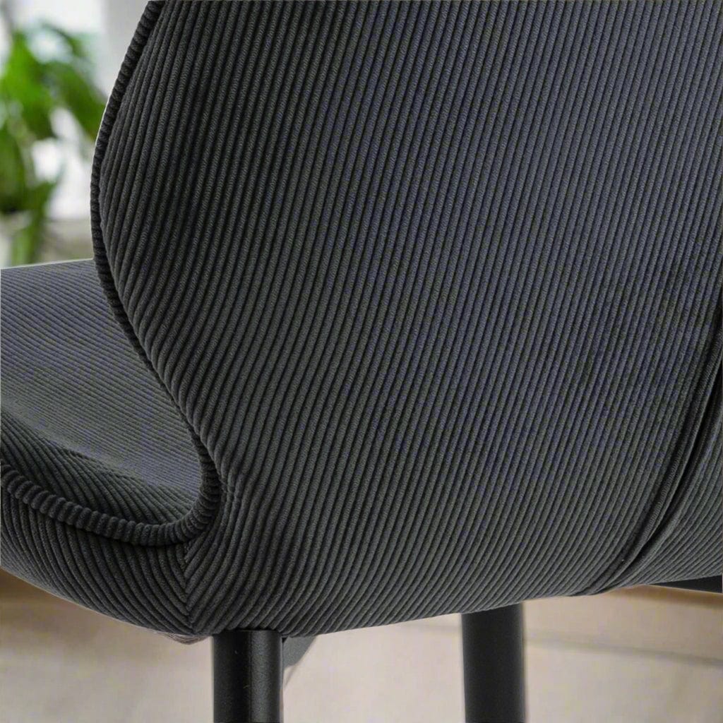 Stylish set of 4 corduroy dining chairs featuring a textured fabric design and comfortable seating, perfect for adding a touch of warmth and modern charm to any dining room or contemporary space