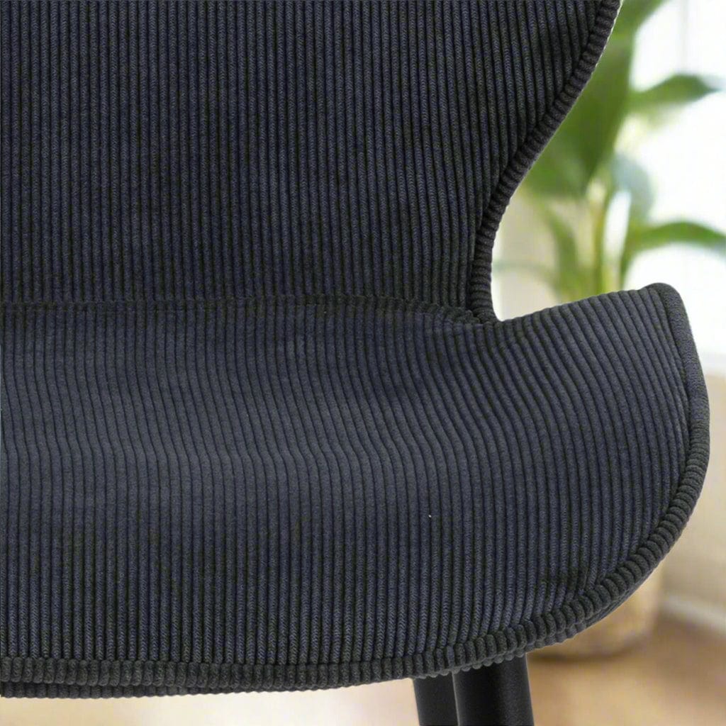 Stylish set of 4 corduroy dining chairs featuring a textured fabric design and comfortable seating, perfect for adding a touch of warmth and modern charm to any dining room or contemporary space