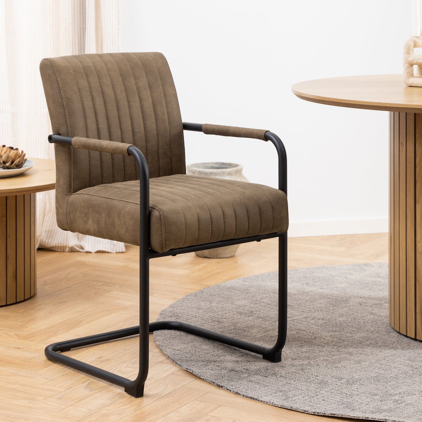 Charming set of 2 brown retro dining chairs with armrests, featuring a vintage-inspired design and comfortable seating, perfect for adding a stylish and nostalgic touch to any dining room or kitchen