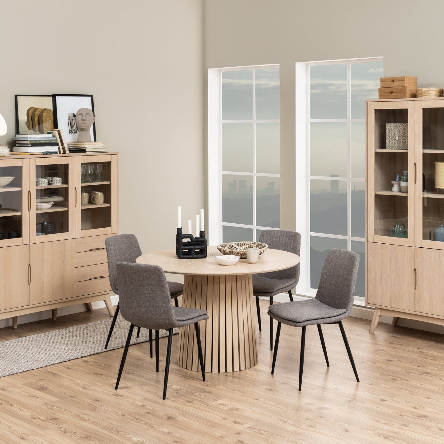 Elegant set of 4 brown upholstered dining chairs featuring a soft fabric finish and sturdy frame, perfect for adding comfort and sophistication to any dining room or modern space