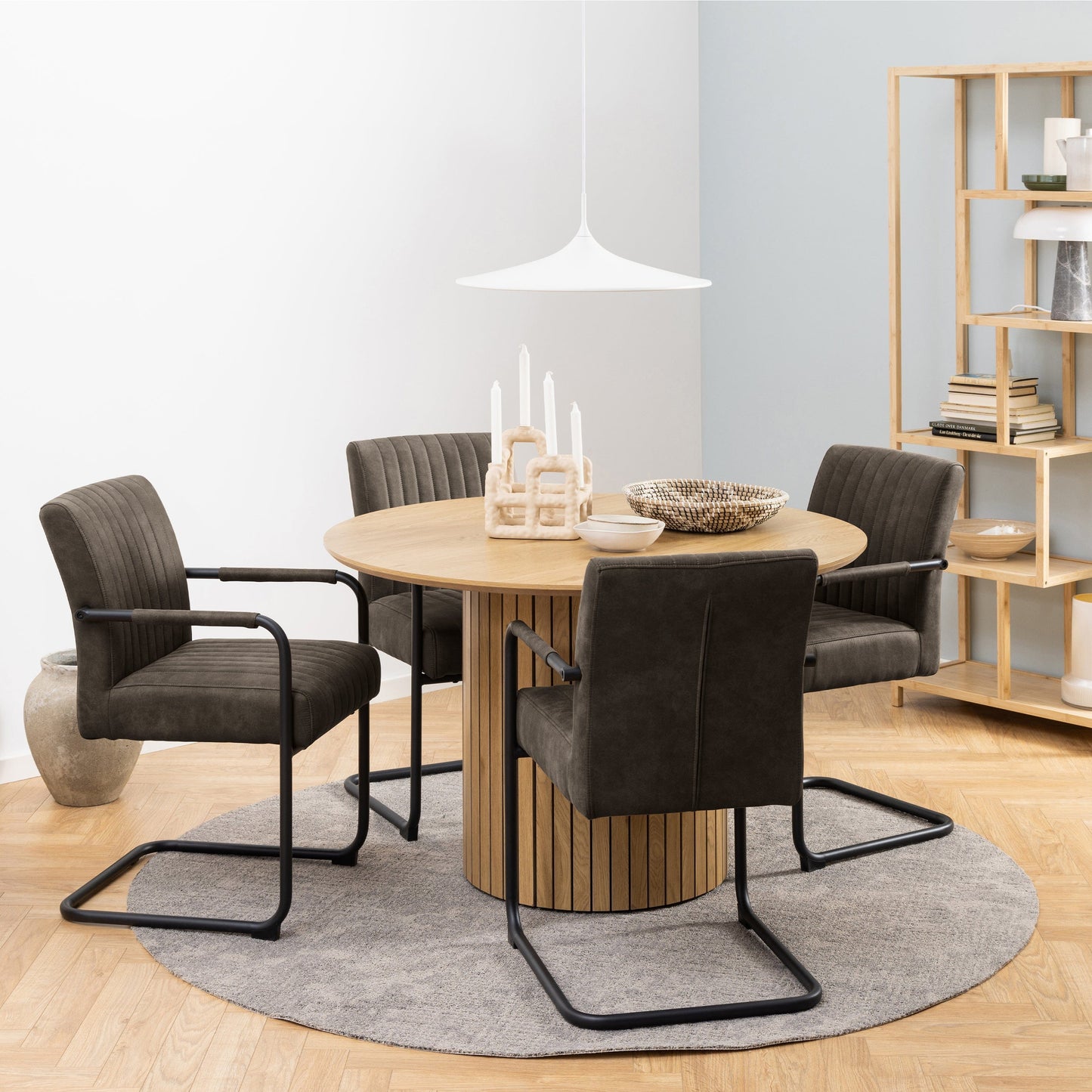 Charming set of 2 black retro dining chairs with armrests, featuring a vintage-inspired design and comfortable seating, perfect for adding a stylish and nostalgic touch to any dining room or kitchen