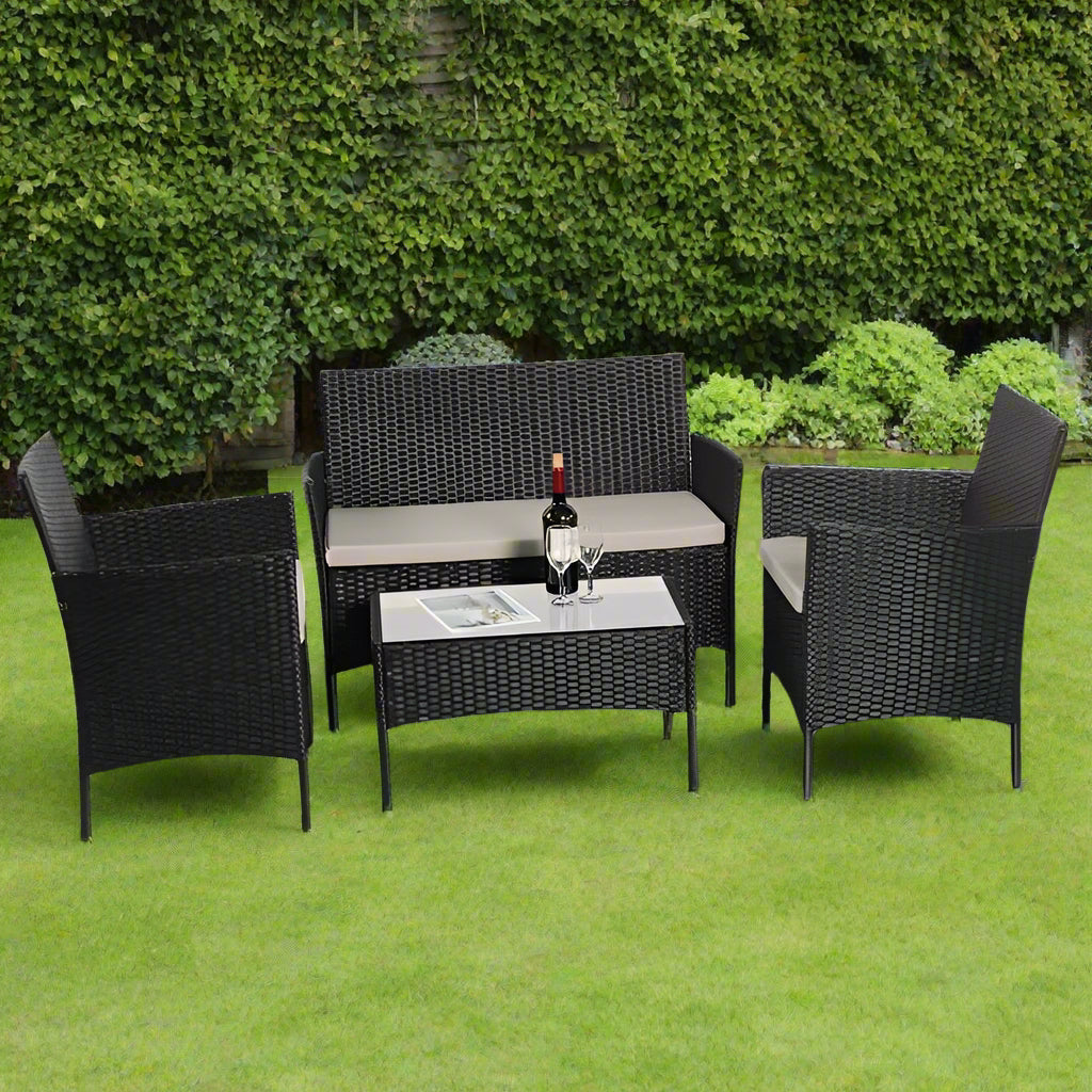 Amazon 4-piece rattan garden furniture set with grey cushions, featuring two chairs, a sofa, and a coffee table with tempered safety glass, made from weather-resistant PE rattan and coated metal frame, perfect for outdoor and indoor use.