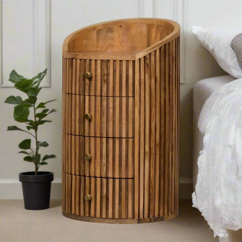 Exquisite handcarved bedside table with intricate detailing, featuring a smooth top and elegant legs, adding a touch of artisanal craftsmanship and vintage charm to any bedroom decor