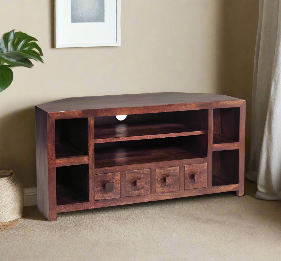 Eco-friendly Natural Dark Wood Corner TV Stand made from 100% Solid Mango Hardwood. Handcrafted with a deep walnut stain, this fully assembled piece combines contemporary style and sustainability. Easy to clean and maintain, it features dimensions of 110 x 45 x 55 cm (WxDxH). Perfect for any modern living room, offering both elegance and durability while showcasing the beauty of eco-sourced wood.