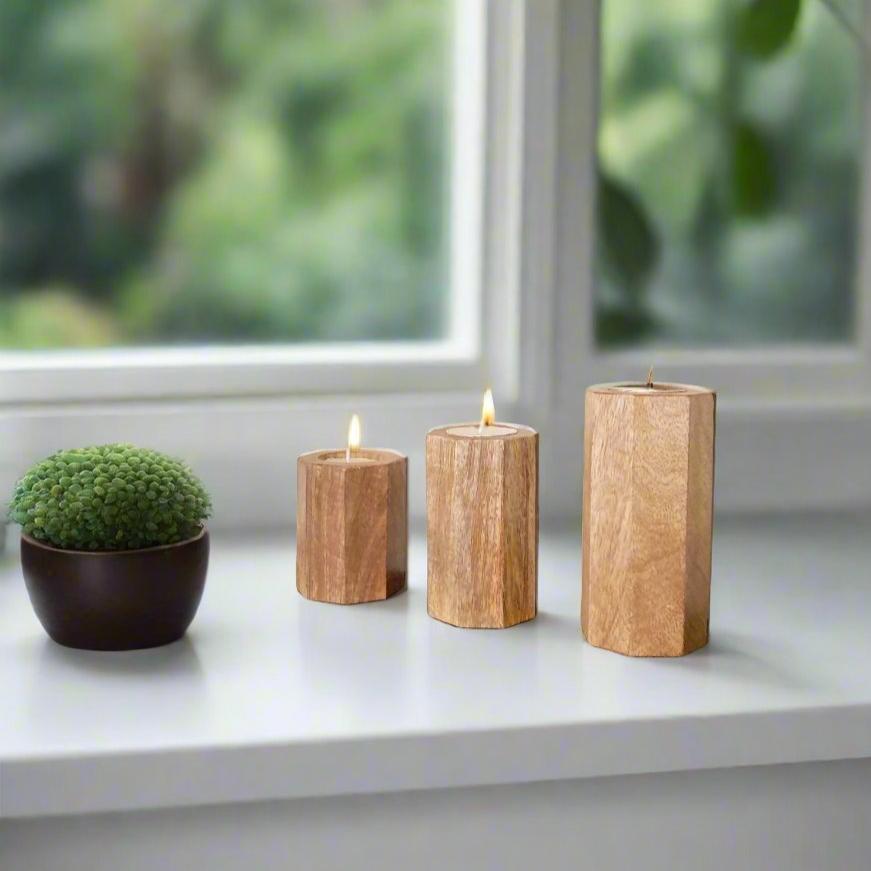 Elegant hexagon tealight holders with a modern design, perfect for adding a touch of ambiance and sophistication to any setting, featuring a geometric shape and a stylish finish