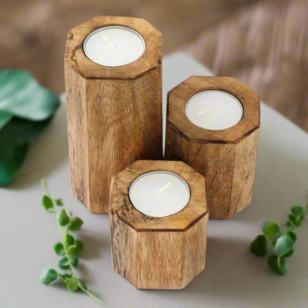 Elegant hexagon tealight holders with a modern design, perfect for adding a touch of ambiance and sophistication to any setting, featuring a geometric shape and a stylish finish