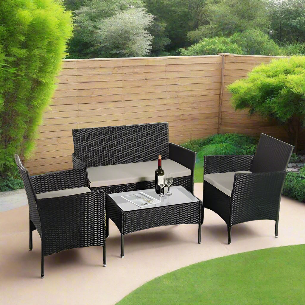 Amazon 4-piece rattan garden furniture set with grey cushions, featuring two chairs, a sofa, and a coffee table with tempered safety glass, made from weather-resistant PE rattan and coated metal frame, perfect for outdoor and indoor use.