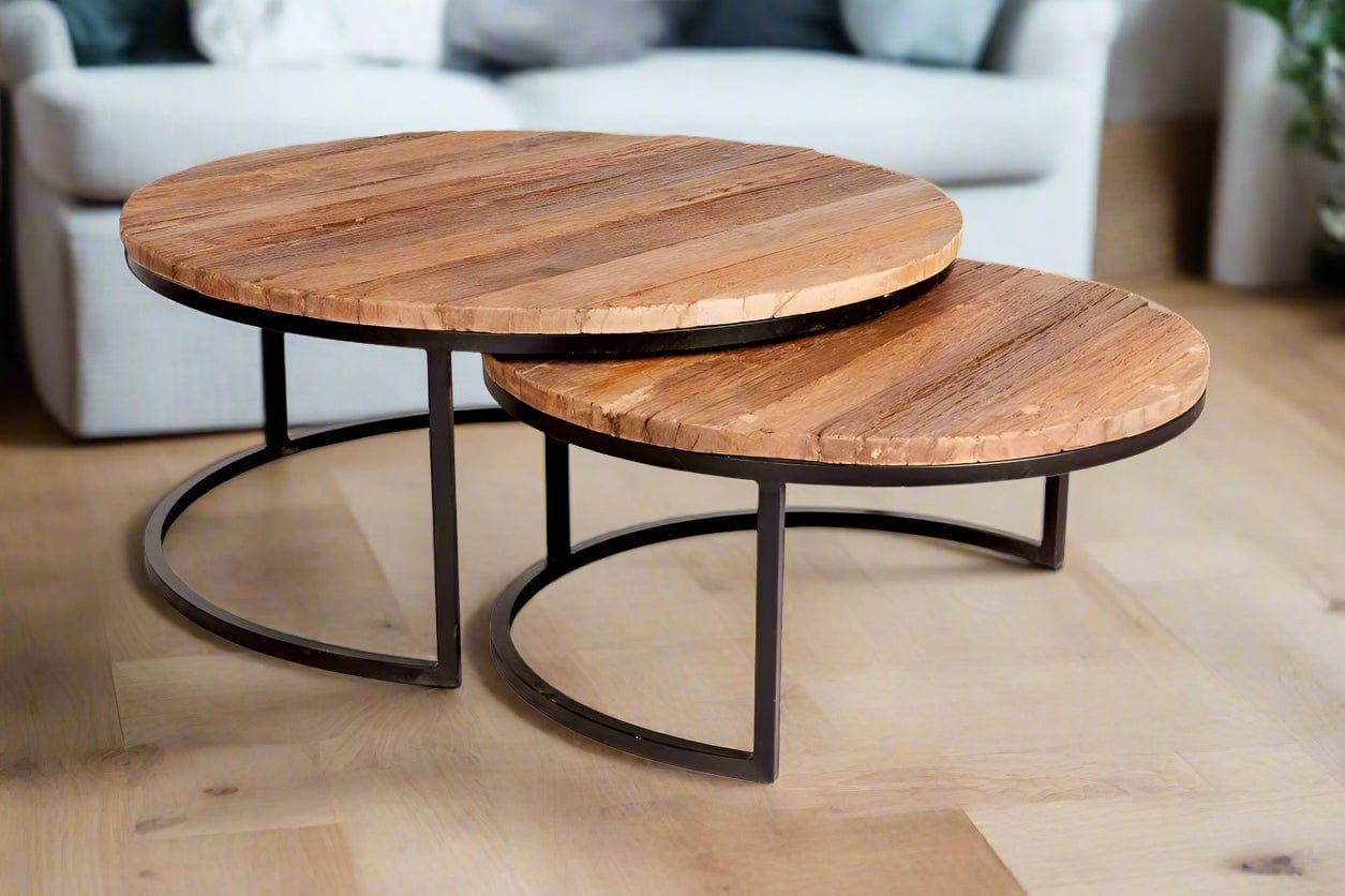 Set of two round coffee tables made from reclaimed railway sleepers with black metal frames, offering a stylish and eco-friendly design.