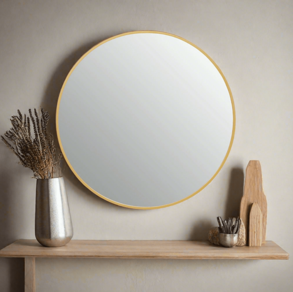 Small round wall mirror with a sleek gold finish iron frame, featuring a minimalist design that adds elegance to any space. Free delivery included.