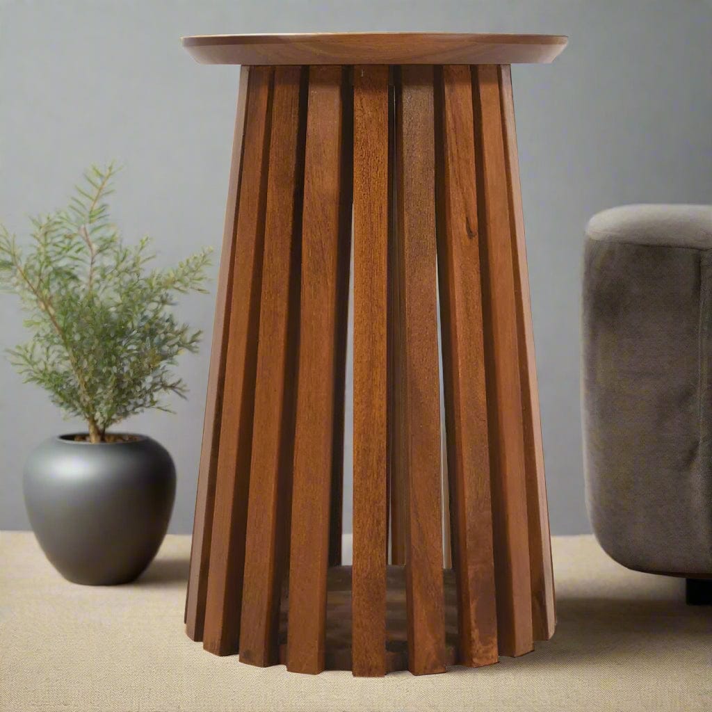 "Slatted round end/side table made from solid mango wood with a warm walnut finish, featuring a contemporary design with a tapered slatted base, fully assembled and easy to maintain."
