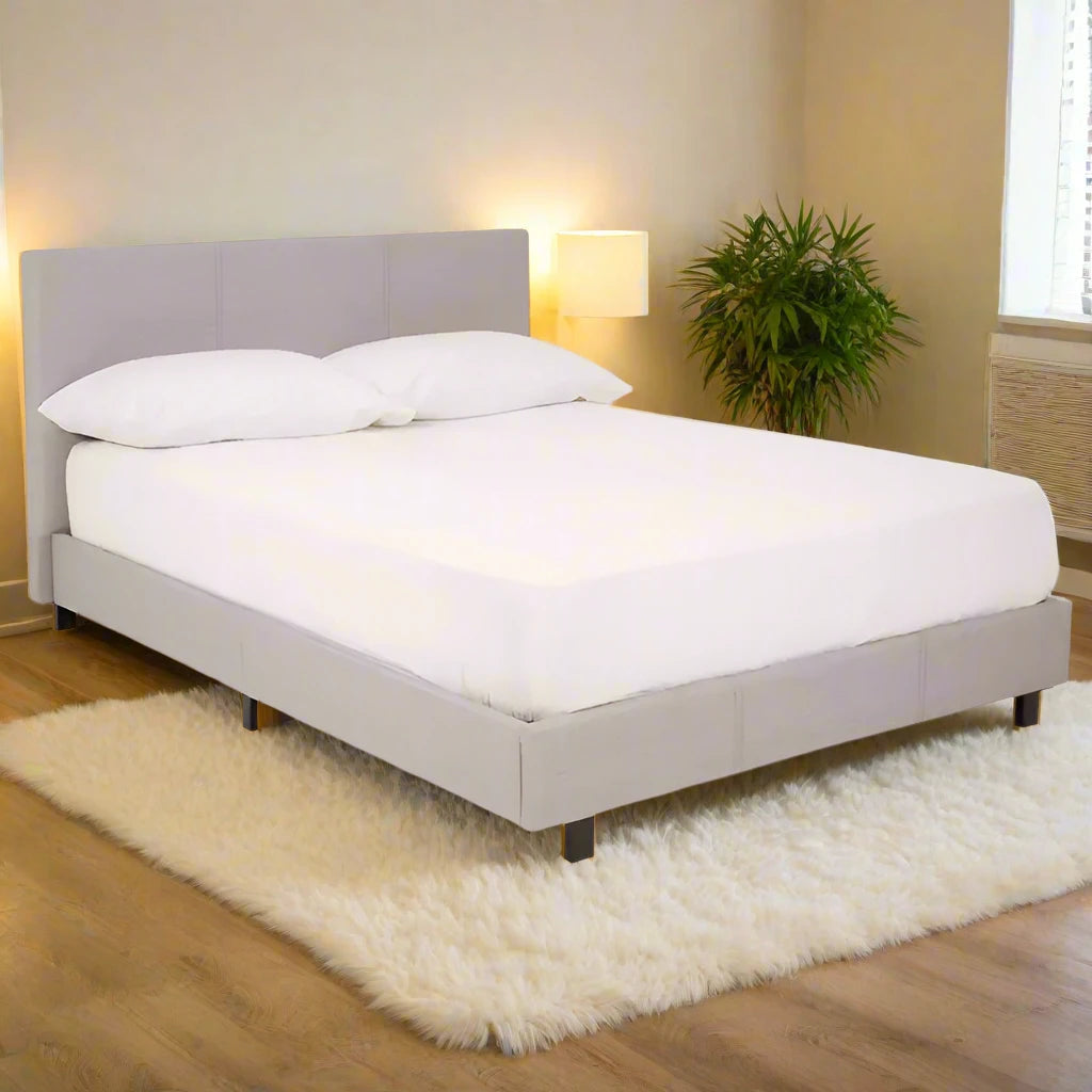 Elegant light grey fabric king bed frame with a modern design, featuring a sturdy structure and soft upholstered finish, perfect for creating a stylish and comfortable focal point in any bedroom