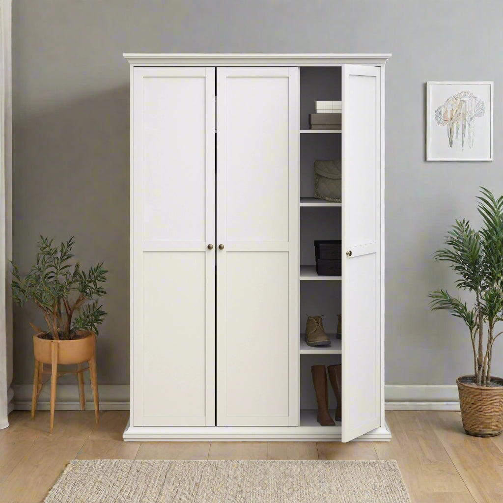 
A Classic White Wardrobe featuring a clean, timeless design with ample storage space for clothing and accessories. This wardrobe includes a hanging rail for garments and shelves for organizing items. The crisp white finish adds a fresh, sophisticated touch to any bedroom or closet, complementing both modern and traditional decor styles. Perfect for enhancing storage and organization, this classic white wardrobe combines functionality with a stylish, minimalist look for your home.