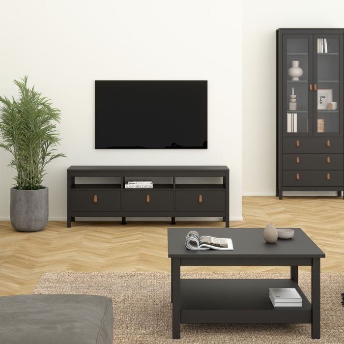 Modern TV unit with three drawers, brown leather tab handles, and a sleek matt black finish. Made from durable, sustainable wood with easy-gliding drawer runners. Dimensions: W 1512 x H 541 x D 384 mm.