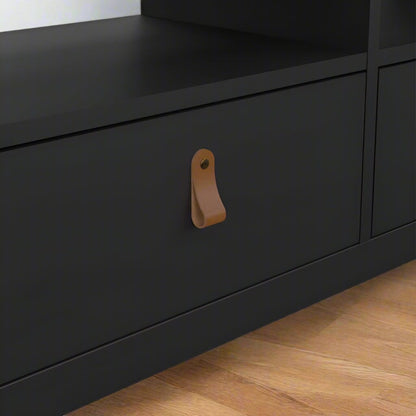 Modern TV unit with three drawers, brown leather tab handles, and a sleek matt black finish. Made from durable, sustainable wood with easy-gliding drawer runners. Dimensions: W 1512 x H 541 x D 384 mm.