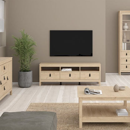 Modern TV unit with three drawers, brown leather tab handles, and a sleek matt black finish. Made from durable, sustainable wood with easy-gliding drawer runners. Dimensions: W 1512 x H 541 x D 384 mm.