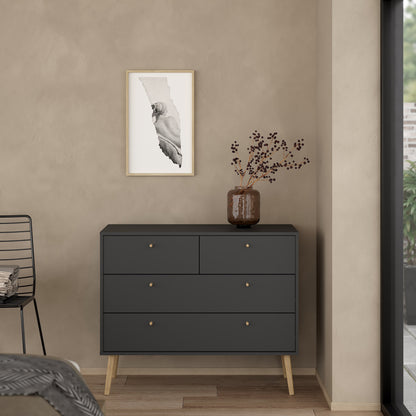 A sleek black oak chest of drawers featuring clean lines and a modern design, with ample storage space in its spacious drawers. The rich, dark oak finish adds a touch of sophistication, making it a stylish and functional addition to any bedroom or living space. Perfect for organizing clothes, accessories, or other essentials, this chest of drawers combines elegance and practicality.