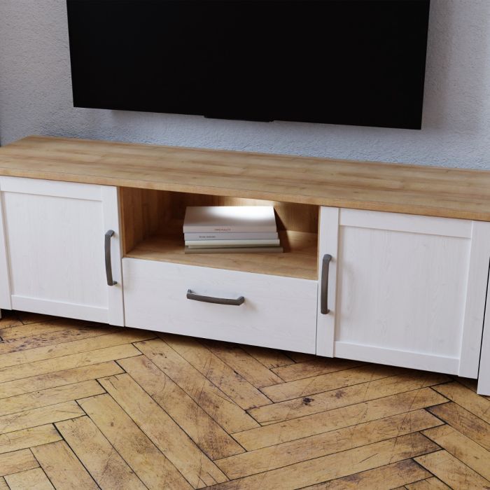 Stylish TV unit with LED lighting, black handles, and soft-close doors. Available in Oak, Navy & Oak, and Grey & Oak finishes, offering rustic elegance and modern functionality. Matching items available.