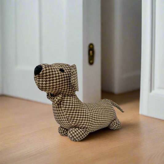 herringbone sauasage dog doorstop. perfect for keeping the draft out in winter. 