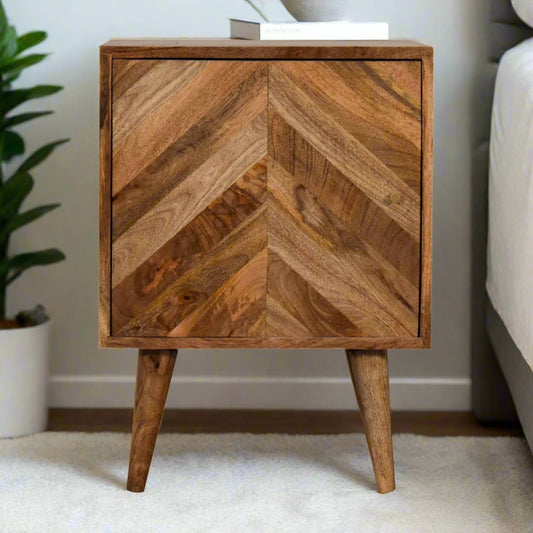 Oak Bedside Table with geometric-patterned cabinet door, brass knobs, and Nordic-style legs. Handmade from ethically sourced wood with internal storage shelves for a tidy and stylish bedroom.