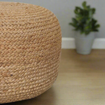 "Handcrafted boho Pouffe in natural jute colour with a thick weave and firm, high-quality filling, perfect as a footstool, extra seating, or decorative piece."