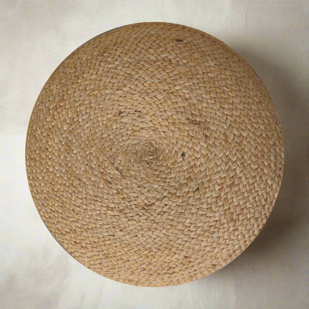 "Handcrafted boho Pouffe in natural jute colour with a thick weave and firm, high-quality filling, perfect as a footstool, extra seating, or decorative piece."