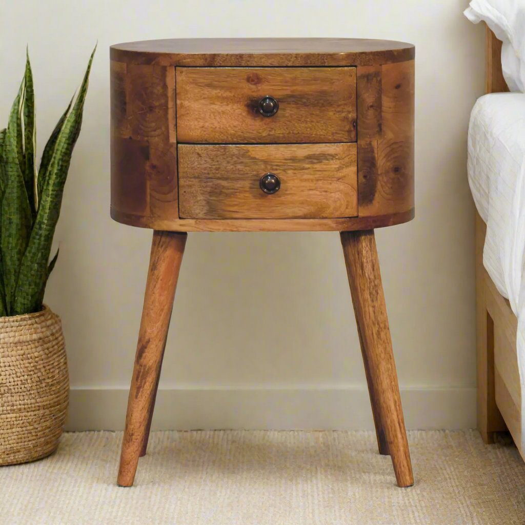 Charming mini oak-ish rounded bedside table with a smooth wood finish, featuring a sleek, compact design and practical storage space, ideal for adding a natural, modern touch to any bedroom