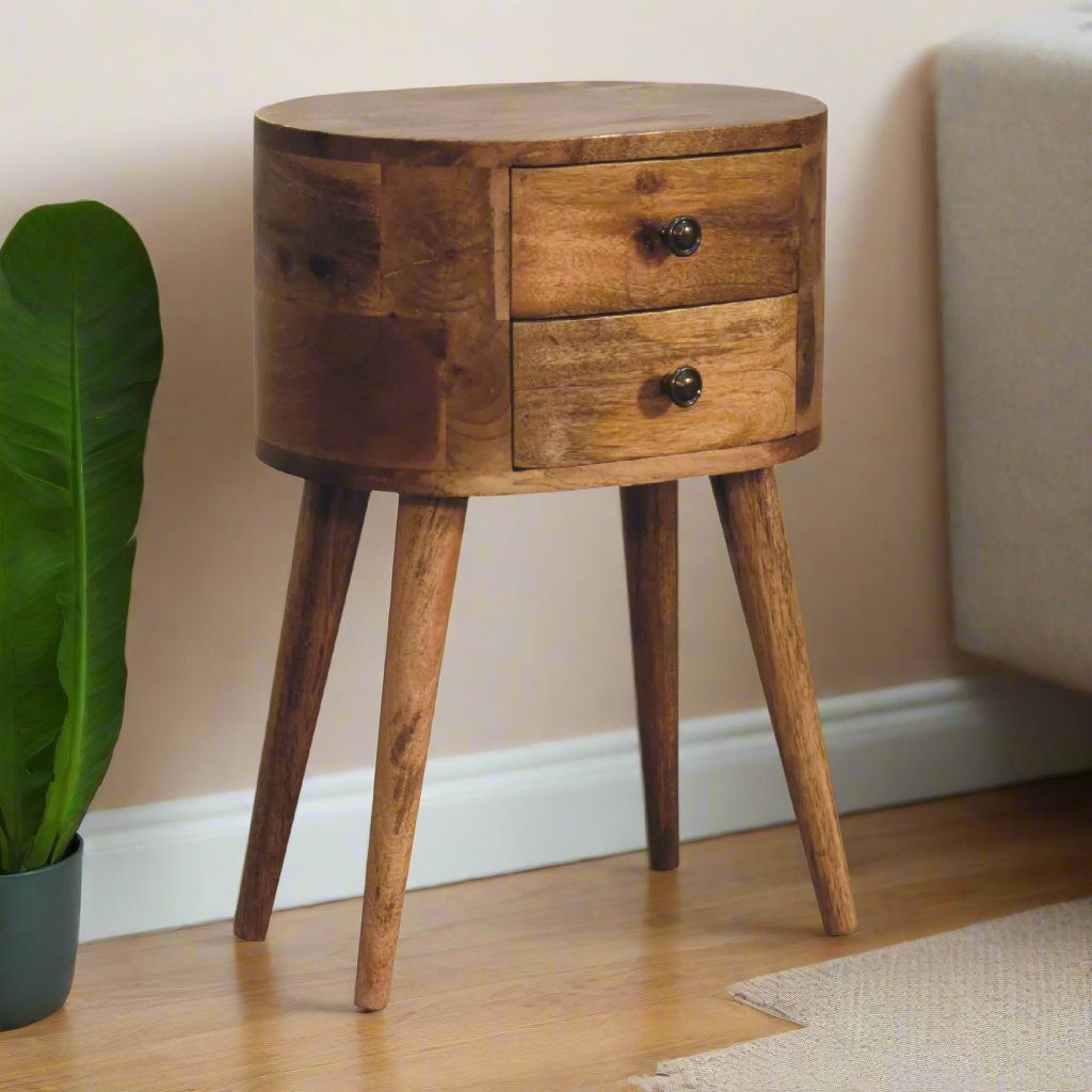 Charming mini oak-ish rounded bedside table with a smooth wood finish, featuring a sleek, compact design and practical storage space, ideal for adding a natural, modern touch to any bedroom