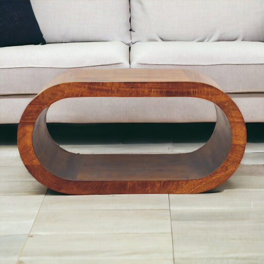 A stylish chestnut caramel coffee table featuring a warm wood finish and a sleek, modern design. This coffee table offers ample surface space for drinks, books, or decorative items, making it both functional and elegant. The rich chestnut caramel color adds a sophisticated touch to any living room or lounge area. Crafted from high-quality materials, this coffee table enhances your home decor with its timeless appeal and versatile style, perfect for both contemporary and traditional interiors.