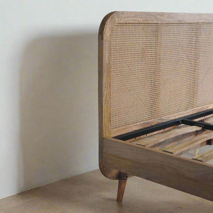 Rattan Bed made from solid mango wood with oak-ish finish, featuring a rattan design on the headboard and footboard, metallic frame with 18 wooden slats, and Nordic-style legs