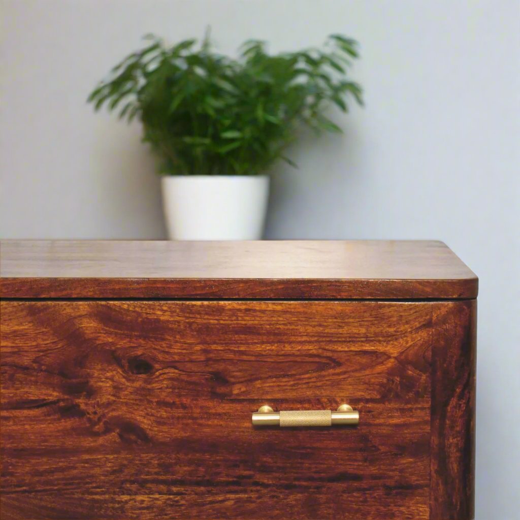 Gold detail chestnut chest of drawers made from solid mango wood with 3 spacious drawers, Nordic-style legs, and shiny gold T-bar handles