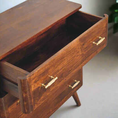 Gold detail chestnut chest of drawers made from solid mango wood with 3 spacious drawers, Nordic-style legs, and shiny gold T-bar handles