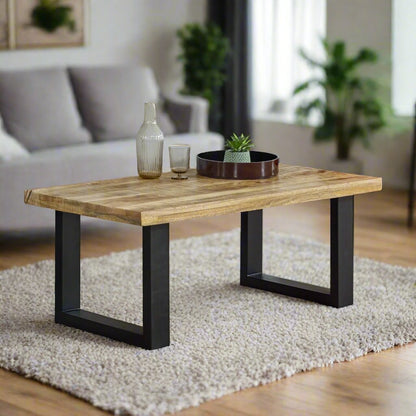 Add natural elegance to your living room with the Solid Acacia Wood Coffee Table, featuring a live edge top and eco-friendly craftsmanship. Measuring 45x115x60 cm (HxWxD), this sustainable table offers a spacious surface and unique wood grain patterns. Easy to assemble with only leg setup required, each table is one-of-a-kind due to natural wood color variations. Perfect for rustic or modern decor, this stylish coffee table comes with free delivery, combining beauty, sustainability, and affordability.