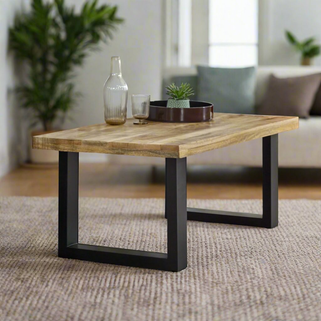 Add natural elegance to your living room with the Solid Acacia Wood Coffee Table, featuring a live edge top and eco-friendly craftsmanship. Measuring 45x115x60 cm (HxWxD), this sustainable table offers a spacious surface and unique wood grain patterns. Easy to assemble with only leg setup required, each table is one-of-a-kind due to natural wood color variations. Perfect for rustic or modern decor, this stylish coffee table comes with free delivery, combining beauty, sustainability, and affordability.