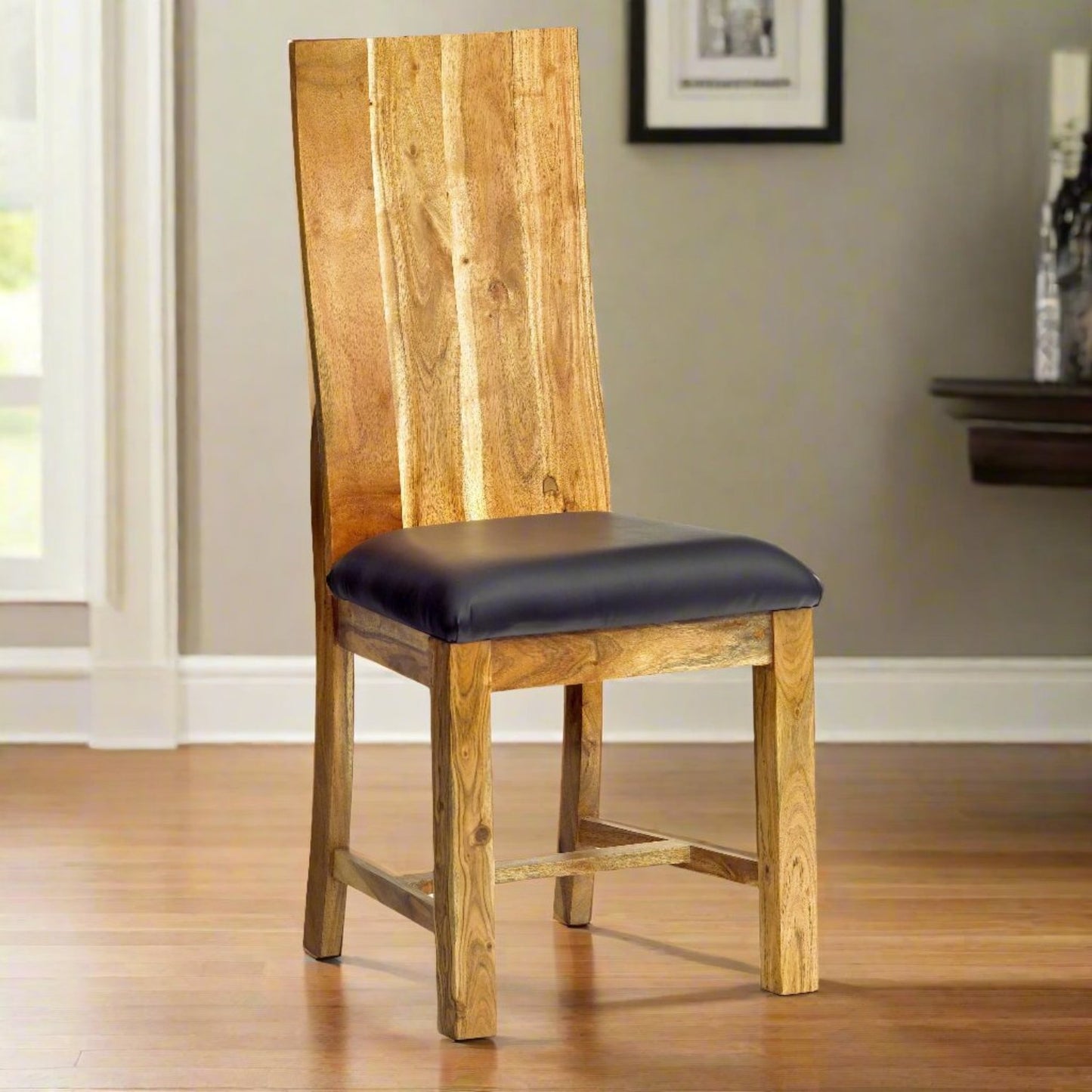 Enjoy free delivery on this Set of 2 Acacia Wood Chairs, crafted from solid eco-sourced acacia wood with sleek black padded seats for comfort. Fully assembled, they feature a slightly distressed finish for rustic charm. Measuring 46x50x105 cm (LxDxH), these durable chairs provide a stylish seating solution. Natural wood variations make each chair unique. A matching table is available separately to complete your dining setup.