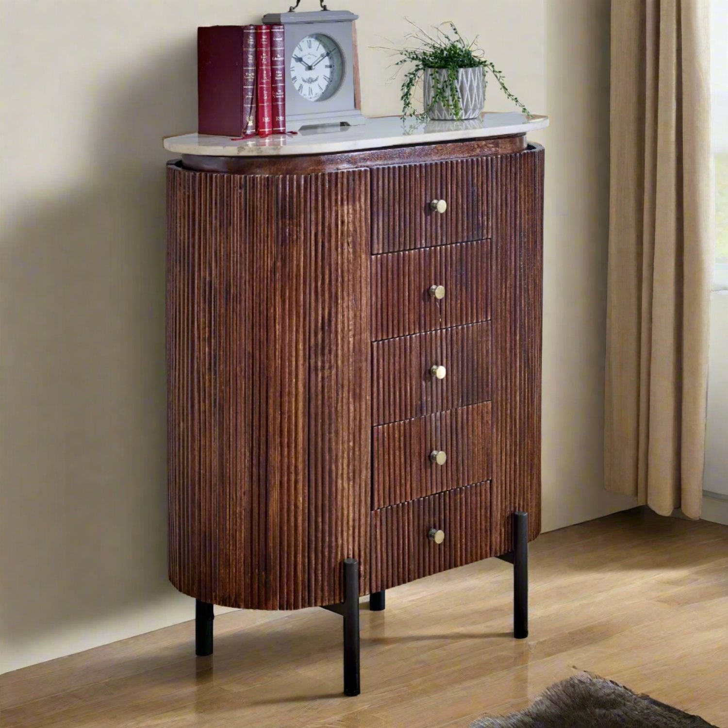 Elegant marble top chest of drawers featuring a sleek design with spacious storage drawers, offering a sophisticated blend of luxury and functionality for any bedroom or living room