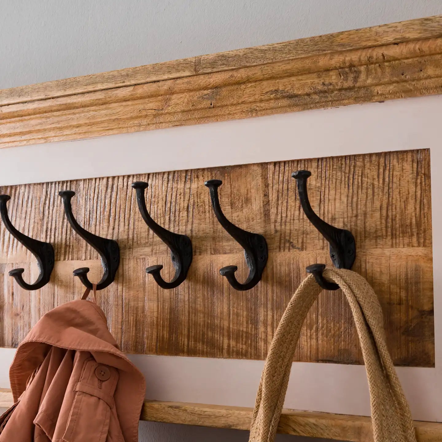 A Wooden Coat Hanger on the Wall featuring a sleek, minimalist design with multiple hooks for hanging coats, hats, or accessories. Crafted from durable wood, this coat hanger adds a rustic yet modern touch to any entryway, hallway, or closet. Its simple and functional design helps keep your space organized while enhancing your home decor with a natural, timeless look. Perfect for adding both practicality and style to your home’s entryway or bedroom.