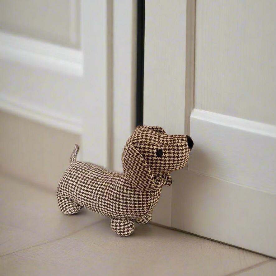 herringbone sauasage dog doorstop. perfect for keeping the draft out in winter. 