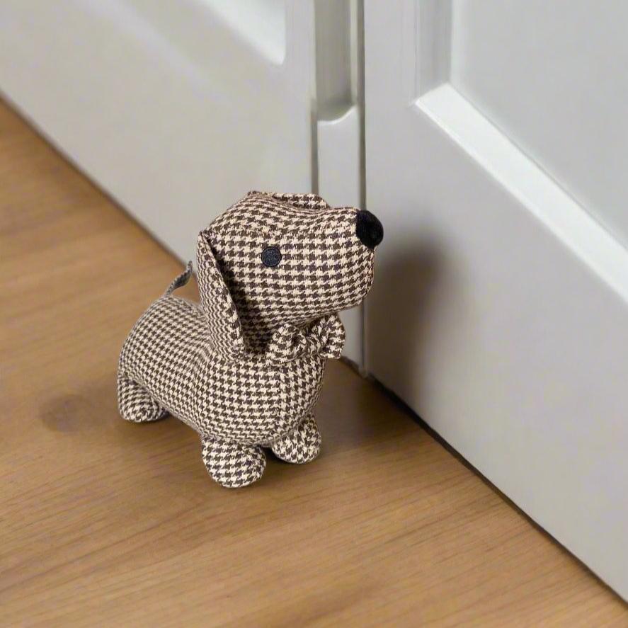 herringbone sauasage dog doorstop. perfect for keeping the draft out in winter. 