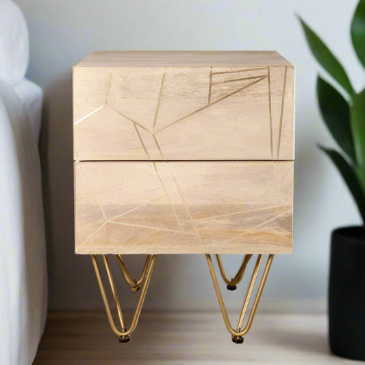 "Modern side table with two drawers, solid mango wood, gold metal inlays on drawer fronts, and angled metal legs, offering a blend of contemporary and retro vintage style."