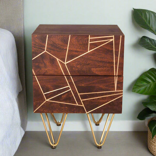 "Modern side table with two drawers, solid mango wood, gold metal inlays on drawer fronts, and angled metal legs, offering a blend of contemporary and retro vintage style."