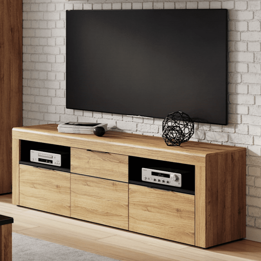 Large Camar TV cabinet in Camargue Oak effect with black metal handles, soft-close doors and drawers, and cable tidy outlets.