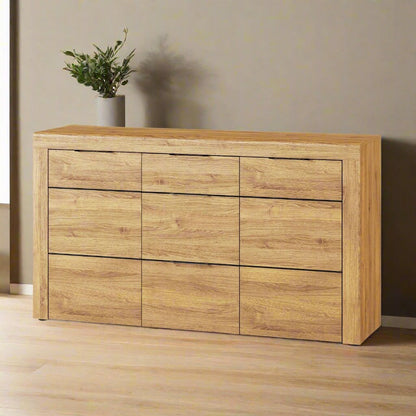 Camar Sideboard in Camargue Oak effect with curved top edge, black metal handles, 3 soft-close drawers, and 2 soft-close cupboard doors.