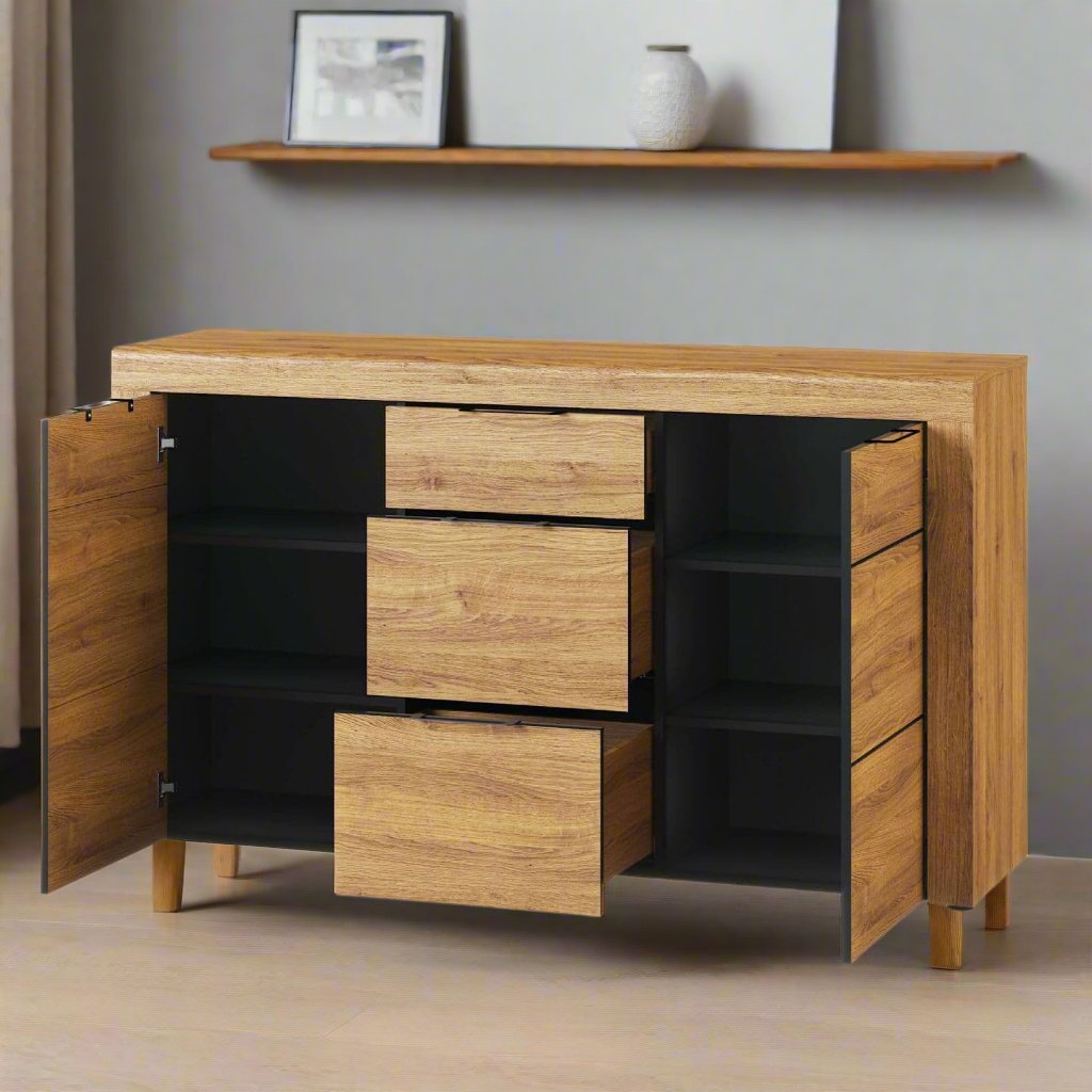 Camar Sideboard in Camargue Oak effect with curved top edge, black metal handles, 3 soft-close drawers, and 2 soft-close cupboard doors.