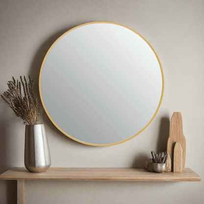 Small round wall mirror with a sleek gold finish iron frame, featuring a minimalist design that adds elegance to any space. Free delivery included.