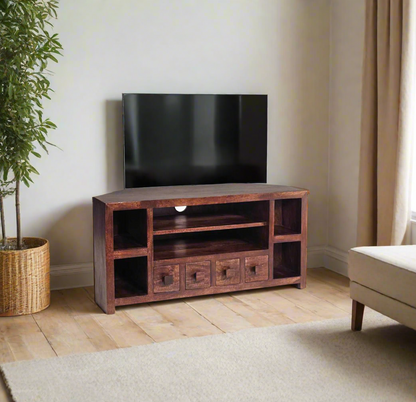 "Eco-friendly Natural Dark Wood Corner TV Stand made from 100% Solid Mango Hardwood. Handcrafted with a deep walnut stain, this fully assembled piece combines contemporary style and sustainability. Easy to clean and maintain, it features dimensions of 110 x 45 x 55 cm (WxDxH). Perfect for any modern living room, offering both elegance and durability while showcasing the beauty of eco-sourced wood."