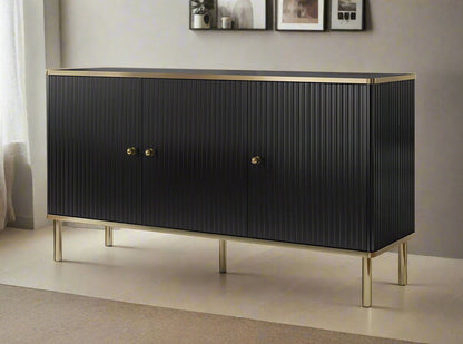 Black and Gold Large Sideboard with a sleek white body, accented by elegant gold handles and edging. Features three doors with internal shelves for convenient storage. Easy to clean and maintain. Dimensions: 75cm H x 140cm W x 40cm D. Free delivery and easy assembly included