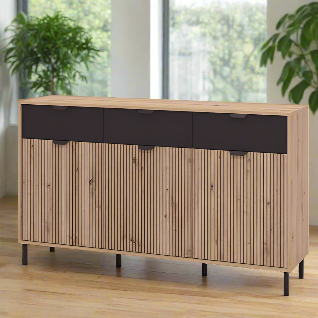 Panelled Oak and Black Sideboard with slatted detailing, featuring three drawers and three doors for ample storage.