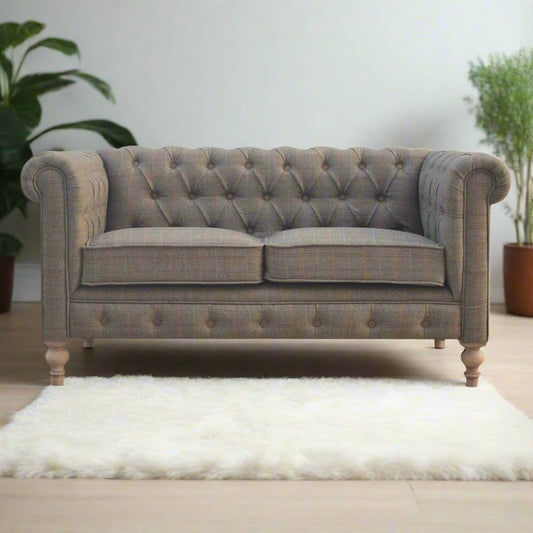 Cosy Multi-Tweed 2-seater sofa with a stylish woven fabric design, offering a comfortable seating option with a modern, textured look, perfect for adding a touch of warmth and elegance to any living room