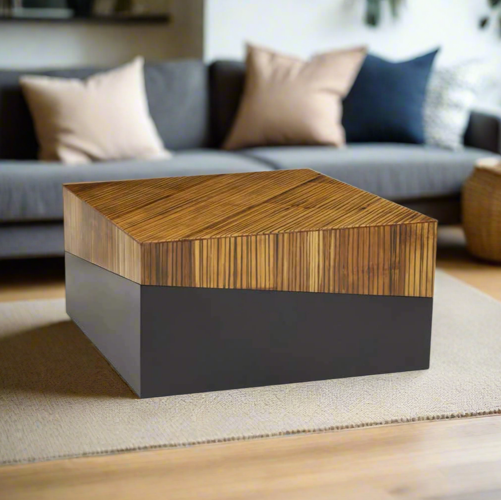 Natural bamboo coffee table with dark ebony finish base, featuring two tonal contrast and an angular intersecting line for a contemporary look.