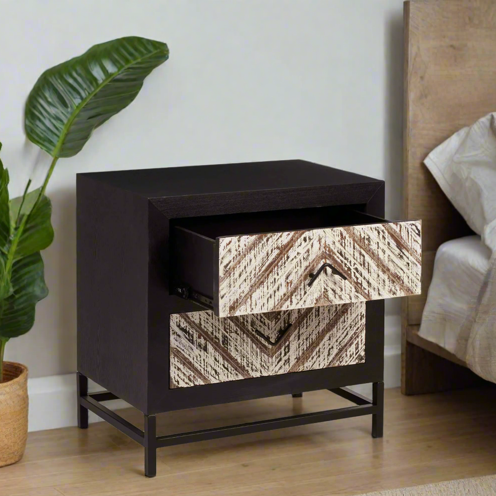 Kuta Black 2 Drawer Bedside Table. The unique geometric design will add a touch of elegance to any room, while providing functional storage options for all of your essentials.